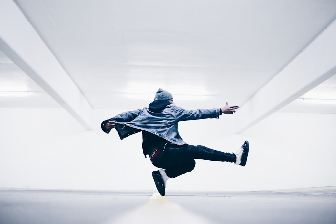 man jumping in the middle taken at daytime man jumping in the middle taken at daytime