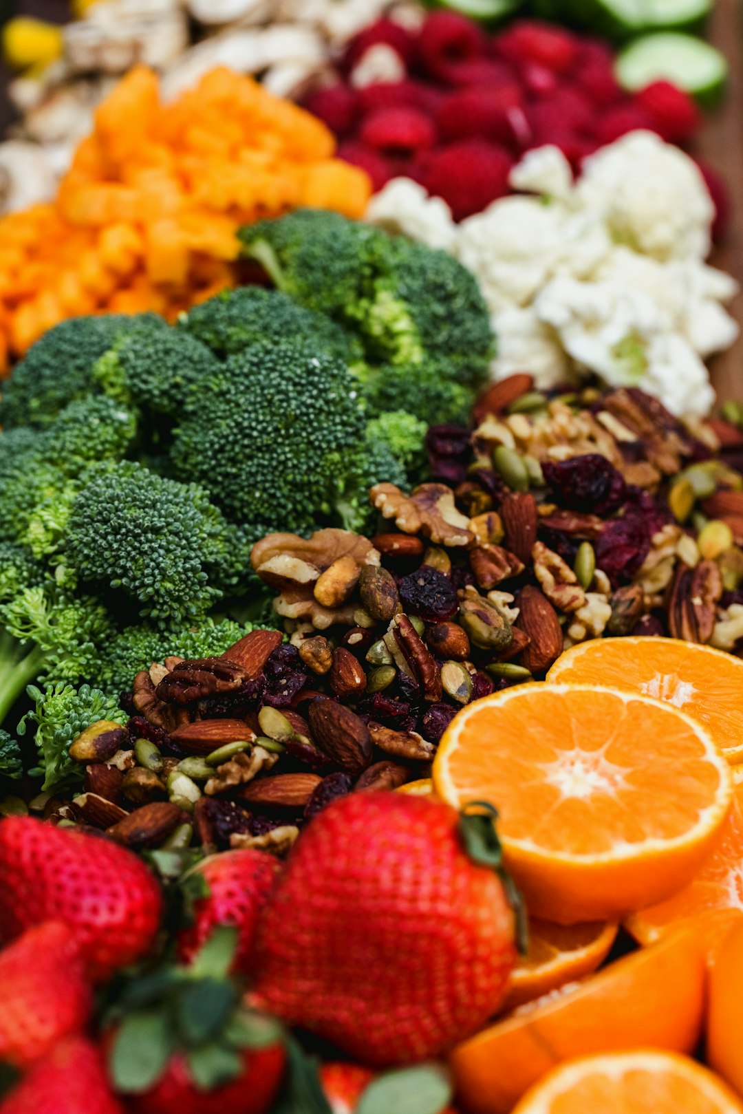 sliced orange fruit and green broccoli sliced orange fruit and green broccoli