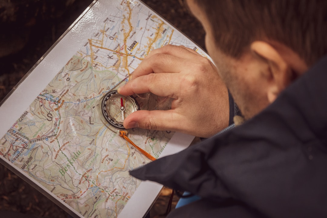 a man holding a magnifying glass a man holding a magnifying glass